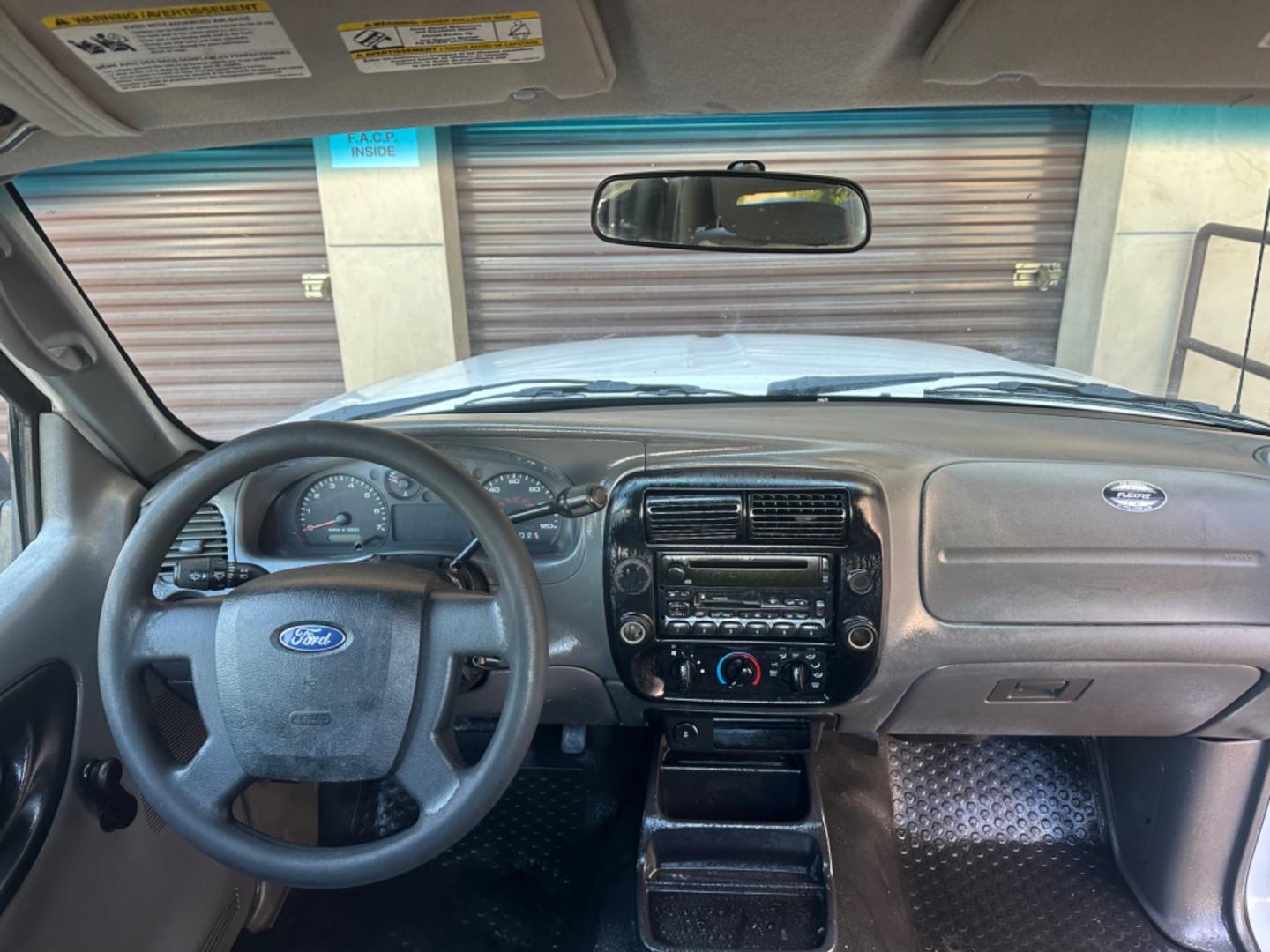 2011 WHITE /GRAY Ford Ranger XL 2WD (1FTKR1AE9BP) with an 4.0L V6 SOHC 12V engine, AUTOMATIC transmission, located at 30 S. Berkeley Avenue, Pasadena, CA, 91107, (626) 248-7567, 34.145447, -118.109398 - Body Style 2-Door REGULAR CAB PICKUP 2-DR Trim XL 2WD Engine 4.0L V6 SOHC 12V Other Transmission AUTOMATIC Drivetrain RWD Ext. Color WHITE Int. Color GRAY Stock Number 7662 VIN 1FTKR1AE9BPA78334 Location Crown City Motors Pasadena, CA WORK TRUCK!!! Crown City Motors is a use - Photo#17